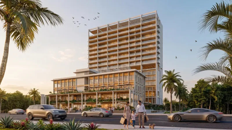 Baalá Cancún: torre de condos con hotel Hilton y plaza comercial, al atardecer — proyecto de MDP Desarrollos.